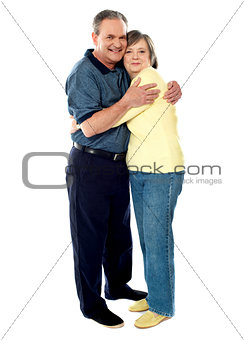 Portrait of happy couple hugging