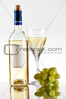 bottle and glass of wine, grape bunch