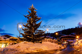 Illuminated Christmas Tree in th Village of Megeve, French Alps,