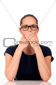Business woman covering her mouth