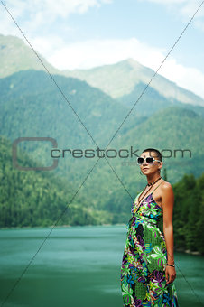 girl in mountains on the lake