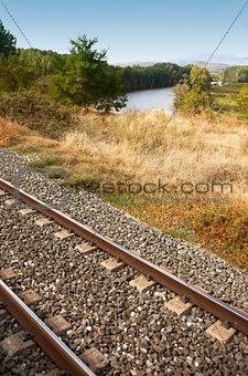 Rail road beside river 