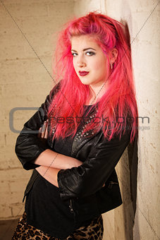 Punk Female Leaning Against Wall