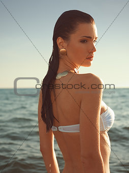 Girl standing in the sea