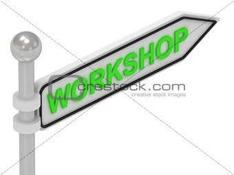 WORKSHOP arrow sign with letters 
