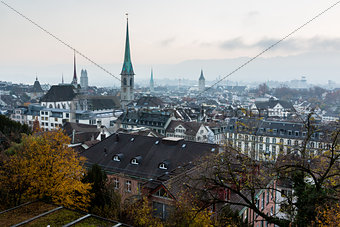 Aerial View on Tiled Roofs and Churches of Zurich at Fall, Switz