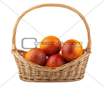 Blood red oranges in wicker basket