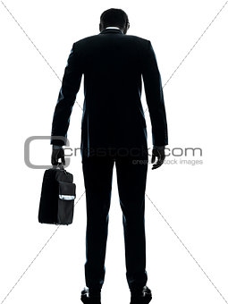 business man sad standing rear view silhouette