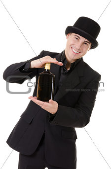 Retro stylish man demonstrates bottle with alcohol