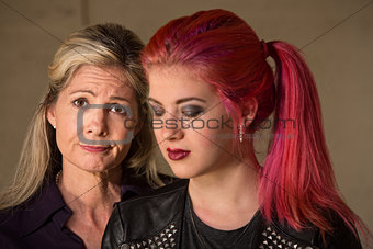 Apologetic Mother and Daughter