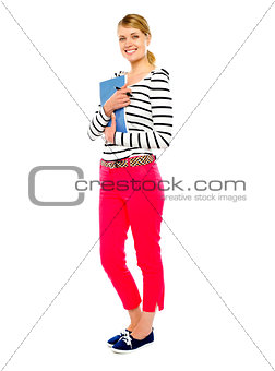 Gorgeous lady posing with pen and notebook