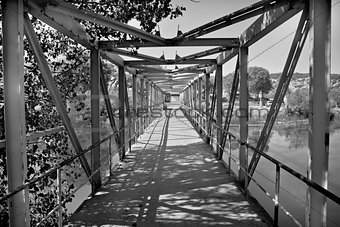 Old style iron river bridge
