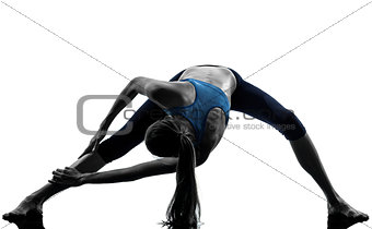 woman exercising yoga stretching legs warm up