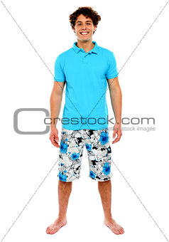 Man standing in shorts