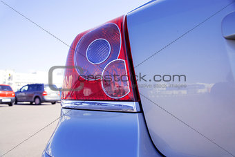 brake lights of modern blue metallic car