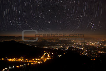 stars trails and city of Varese