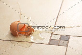 Broken egg on the floor