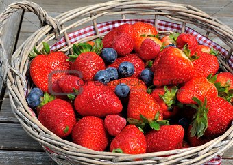 Strawberries, blueberries, raspberries mix in the basket
