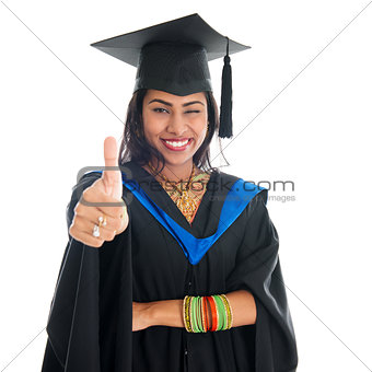 Indian graduate student giving thumb up hand sign