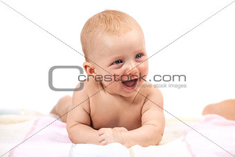 Cute smiling baby boy over white