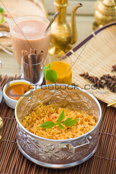 Indian Biryani mutton rice with traditional background