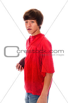 Young teen football boy on white