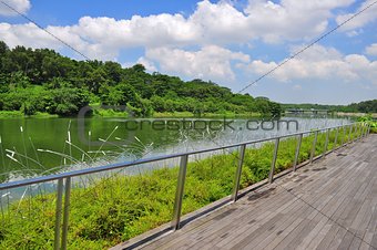 A wooden walkway by the river at Punggol Waterway