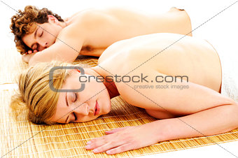 Attractive young couple at spa