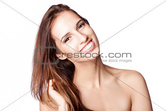 Happy woman touching hair