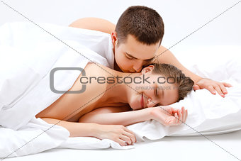 Lover couple in bed