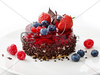 cake with fresh berries and chocolate