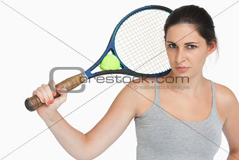 Sportswoman with a tennis racket