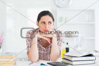Woman leaning her chin on her hands