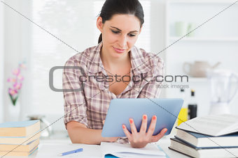 Woman working on a tablet computer