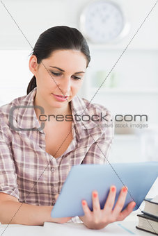 Woman working on an tablet