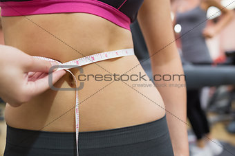 Measuring waist in the gym