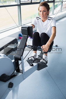 Woman on rowing machine