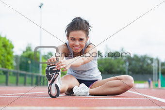 Woman stretching before race