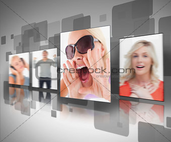 Digital wall displaying four photos