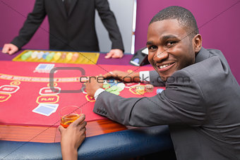 Happy man taking his winnings