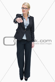 Angry businesswoman pointing