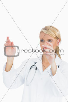 Doctor analysing large blank pane