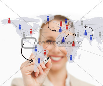 Woman drawing links on the world map