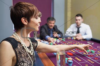 Woman placing a bet