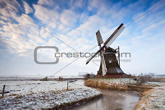 Dutch windmill and cloudscape