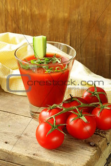cold tomato gazpacho soup with cucumber and arugula