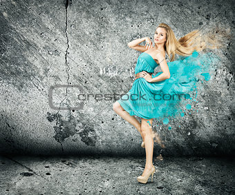 Woman in Splashing Turquoise Dress