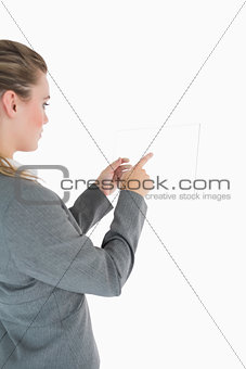 Blonde woman touching glass slide