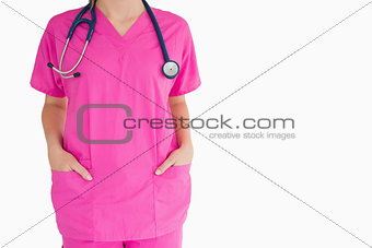 Woman in pink scrubs