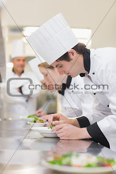 Culinary class preparing salads